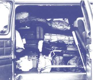 van filled with luggage and supplies