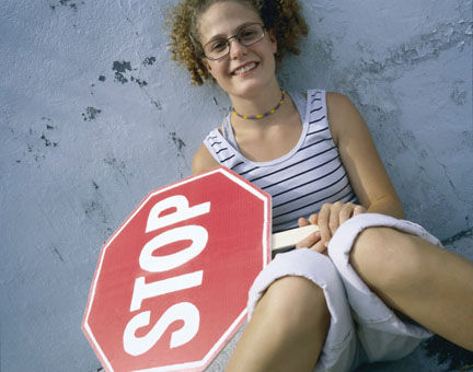girl with stop sign